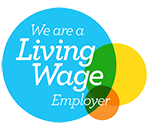 A circular logo featuring the text 'We are a Living Wage Employer.' The design includes overlapping circles in blue, green, yellow, and orange, creating a colorful and modern look.